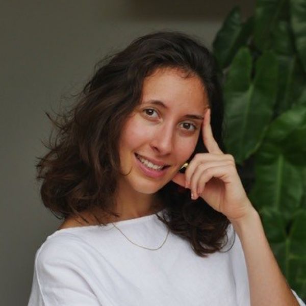 Headshot image of a person smiling into the camera